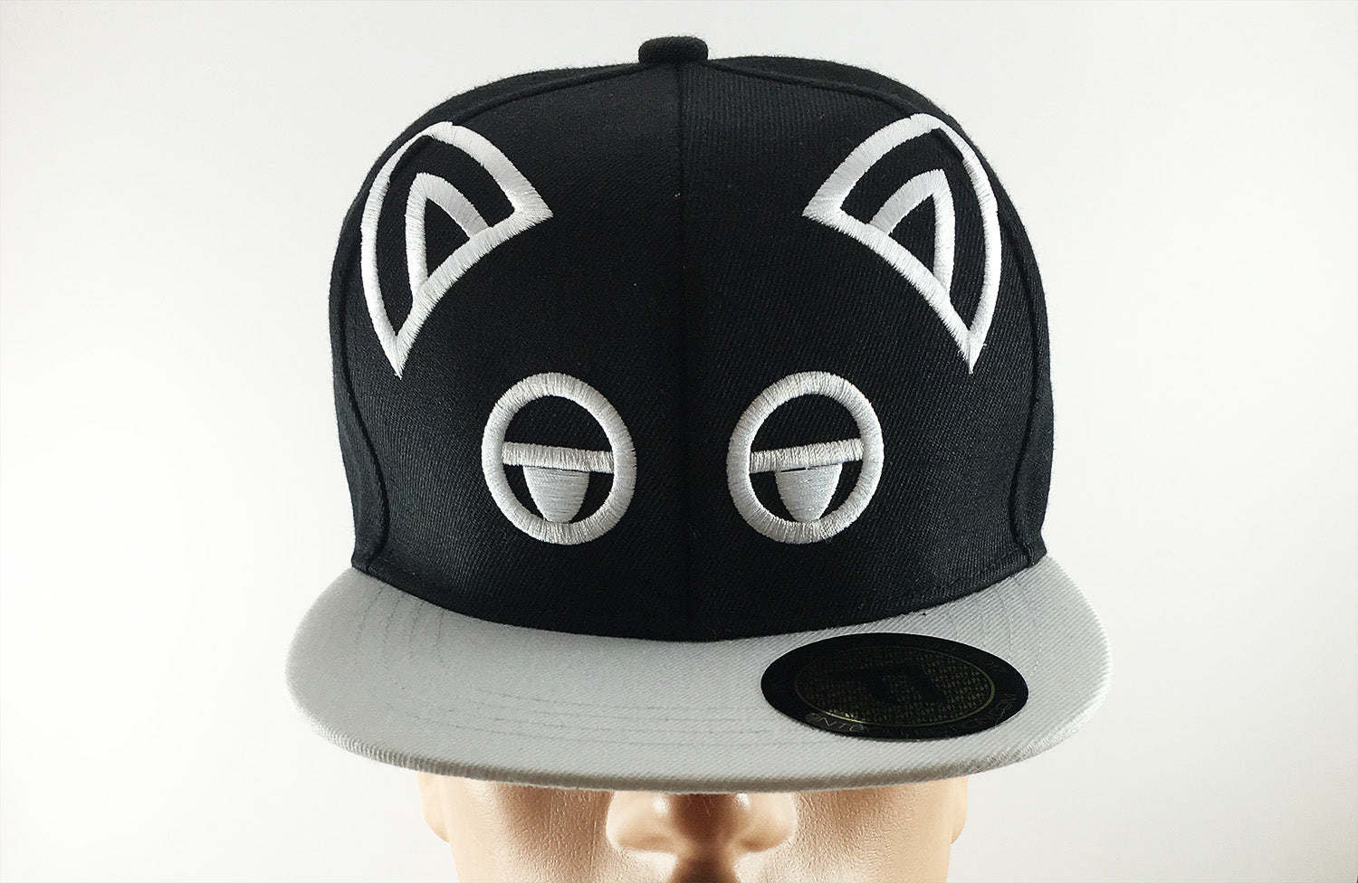 TINT Displeased Cat Face Snapback Hat