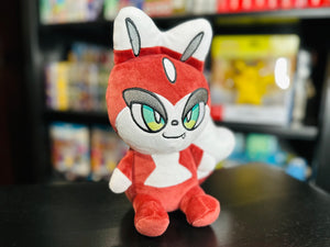 Three-quarter left view of the Folkachi plush from Histrobea Chronicles, highlighting its red and white design, large green eyes, and fox-like appearance. A collectible plush toy tied to the HoopsandHipHop YouTube brand.