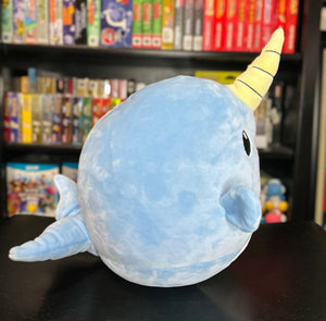 Right side view of Narwade plush from Histrobea Chronicles, highlighting its adorable blue narwhal body and signature yellow horn. Ideal for collectors and HoopsandHipHop fans.